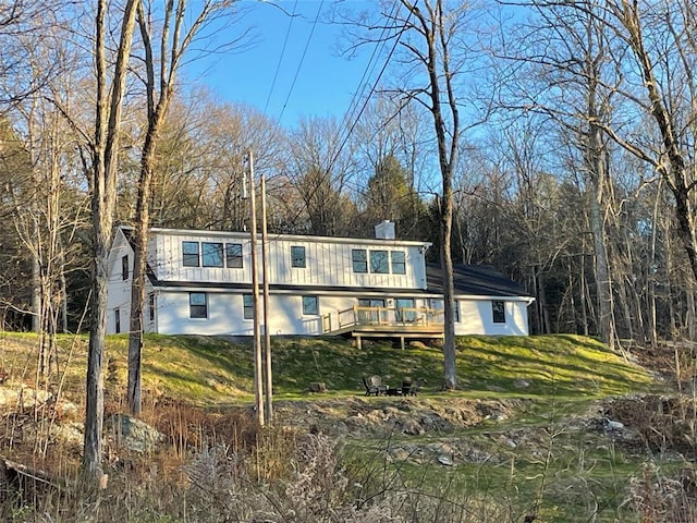 16 Shunpike, Clinton Corners, NY 12514 - view of front of house with a front lawn, a chimney, and a deck