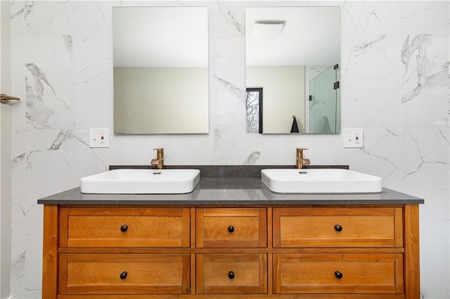 16 Shunpike, Clinton Corners, NY 12514 - bathroom with tile walls, double vanity, and a shower with door