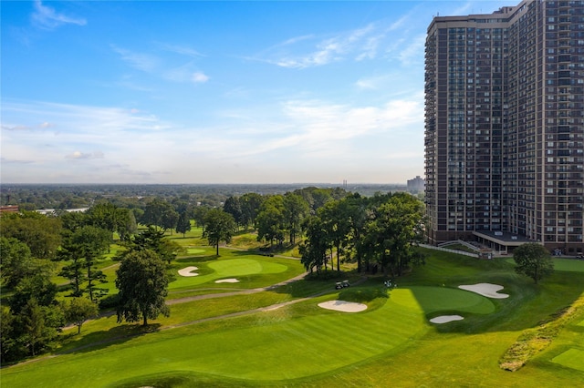 view of home's community featuring golf course view