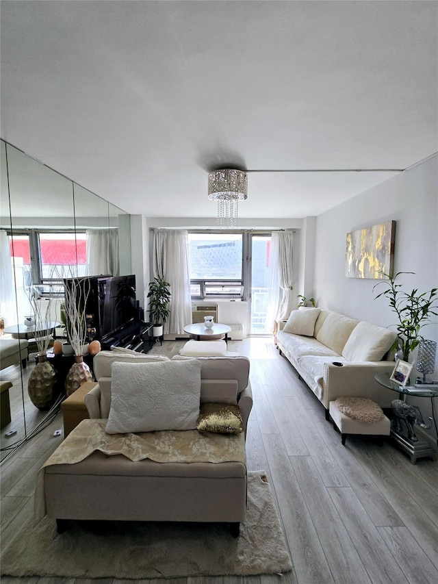 living room featuring plenty of natural light and wood finished floors