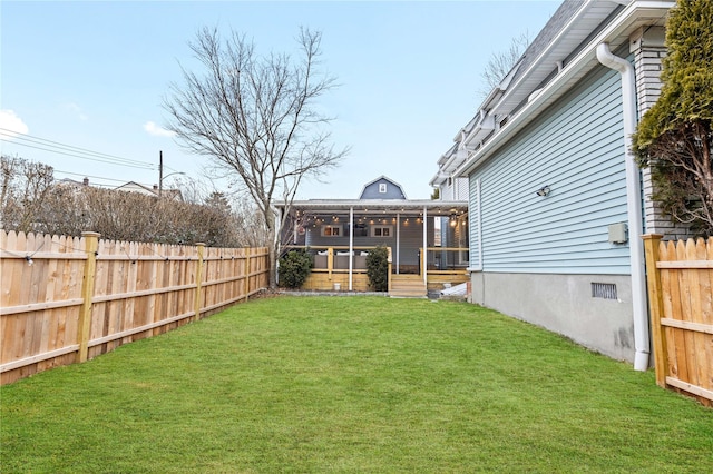 view of yard with a fenced backyard