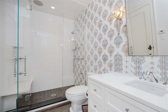 86 Gaylord Dr S, Brooklyn, NY 11234 - full bathroom featuring a stall shower, vanity, toilet, and wallpapered walls