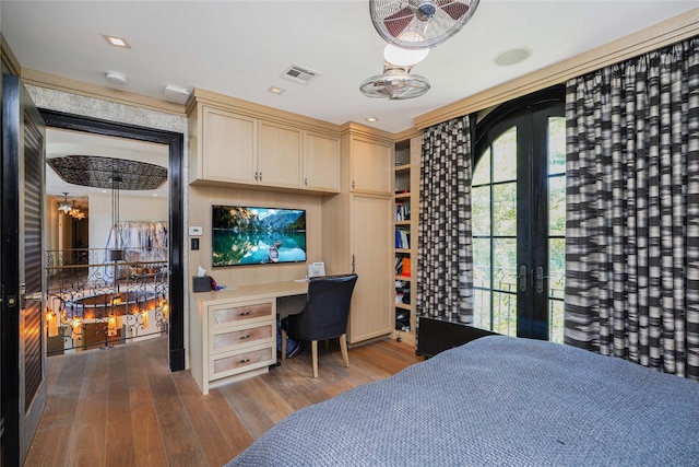 86 Gaylord Dr S, Brooklyn, NY 11234 - bedroom with french doors, built in desk, wood finished floors, and visible vents