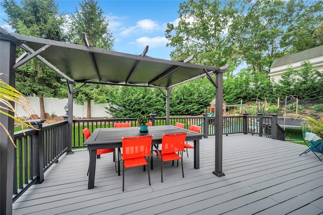 deck with fence and outdoor dining space