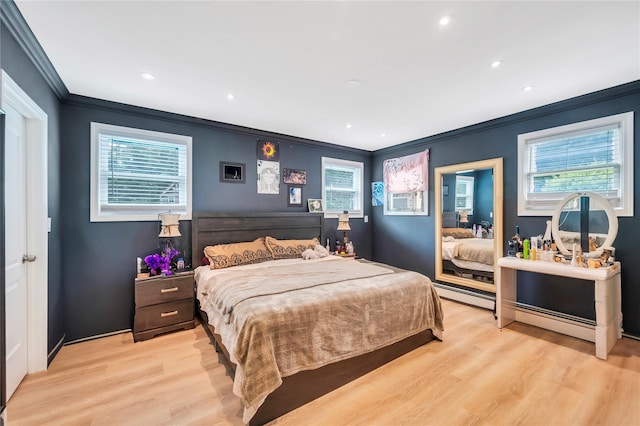 bedroom with crown molding, recessed lighting, a baseboard radiator, and light wood-style floors