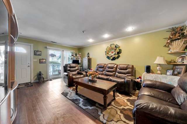 living area with ornamental molding, recessed lighting, and hardwood / wood-style floors