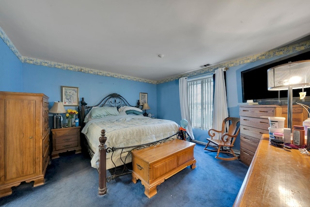 bedroom featuring carpet and visible vents