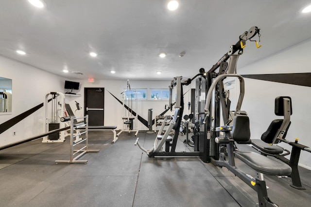 gym featuring recessed lighting and baseboards