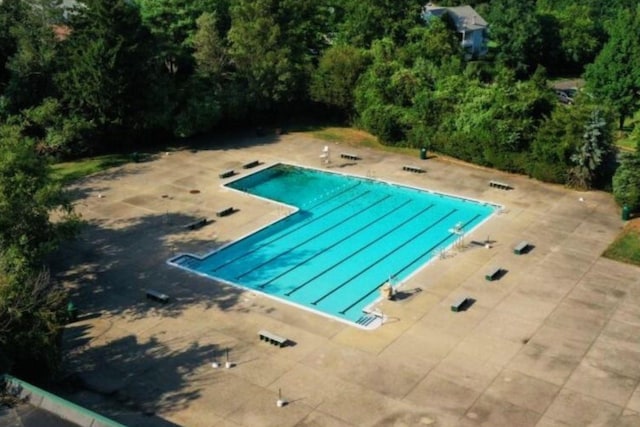 community pool featuring a patio area