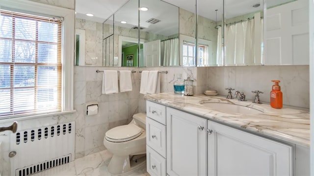 bathroom featuring marble finish floor, curtained shower, radiator, visible vents, and toilet