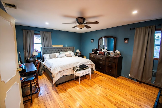 bedroom with light wood-style floors, recessed lighting, visible vents, and ceiling fan