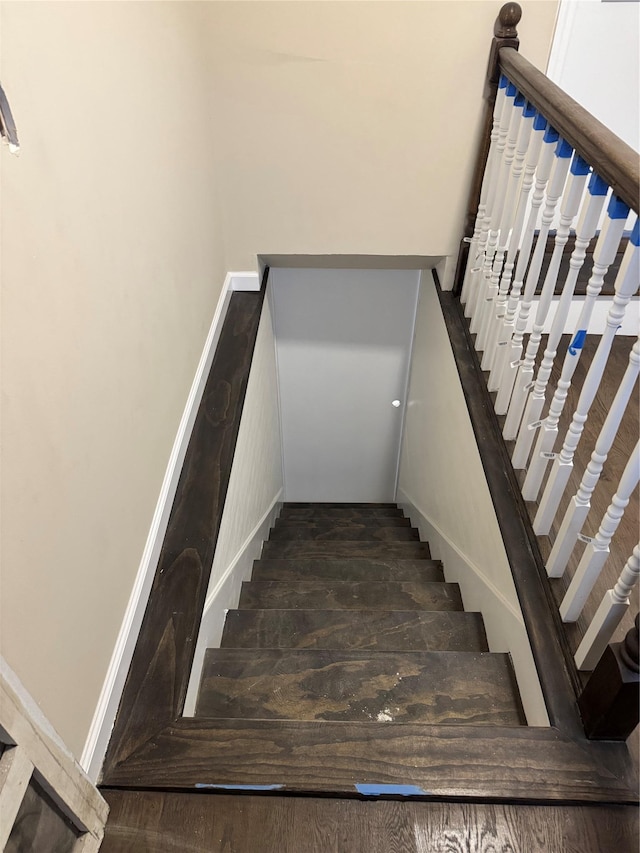 stairway with baseboards