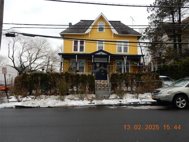 view of front of property with fence