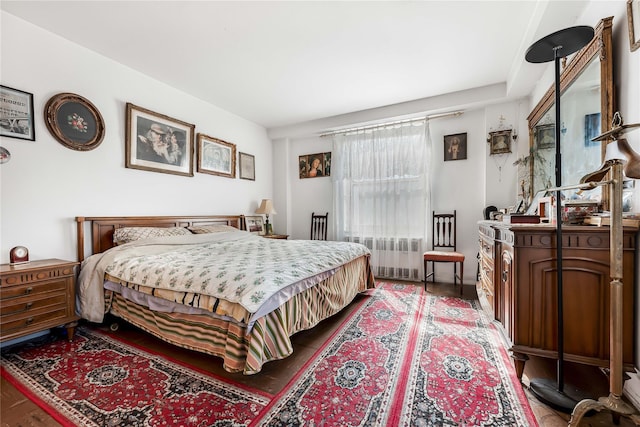 bedroom featuring radiator heating unit