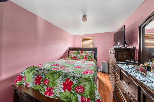 bedroom with light wood-type flooring