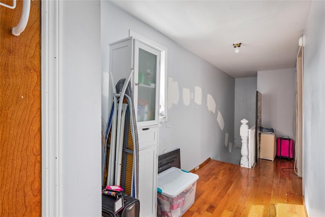 hallway featuring wood finished floors