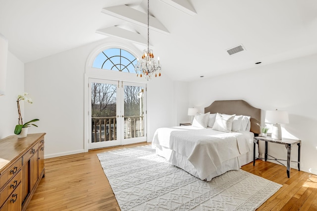 bedroom with access to outside, a notable chandelier, light wood-style flooring, and visible vents