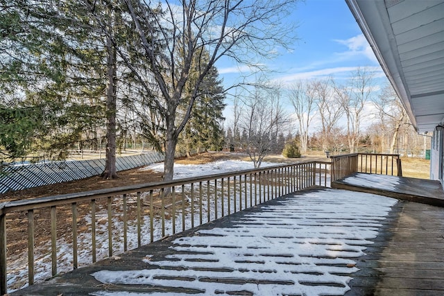 view of snow covered deck