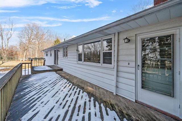 view of snow covered deck