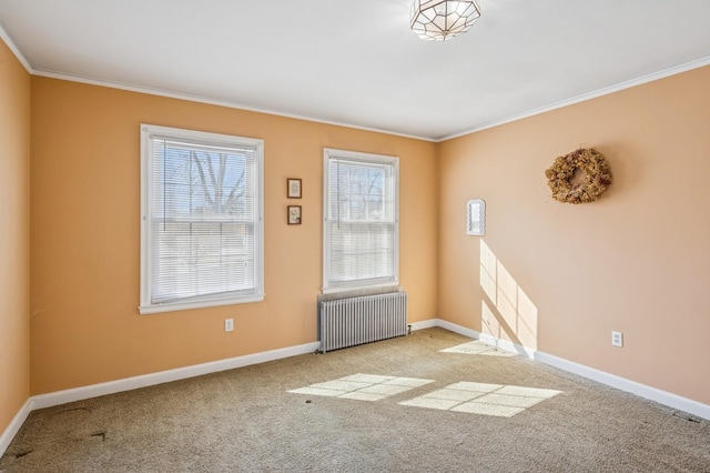 unfurnished room with baseboards, crown molding, carpet, and radiator