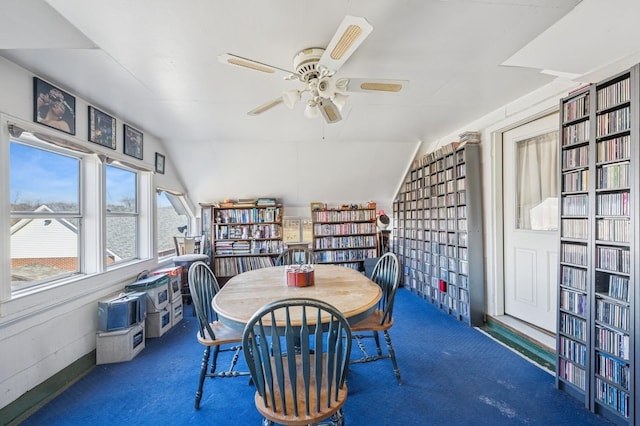 dining room featuring ceiling fan and carpet flooring