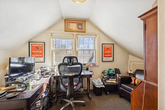 office area featuring carpet floors and vaulted ceiling