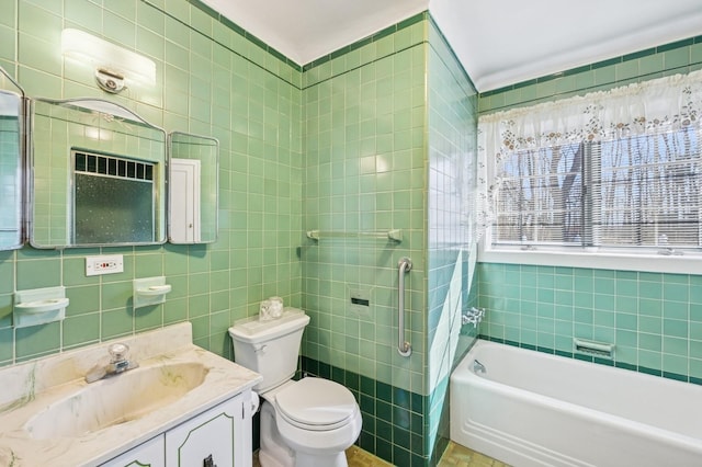 full bath featuring a washtub, a shower, tile walls, toilet, and vanity