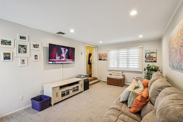 living area featuring a baseboard heating unit, recessed lighting, visible vents, and light colored carpet