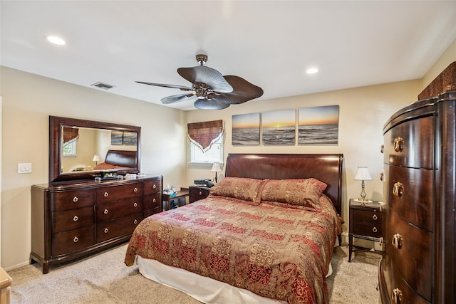 bedroom with recessed lighting, light colored carpet, visible vents, ceiling fan, and baseboards