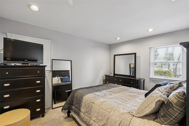 bedroom featuring recessed lighting and light colored carpet