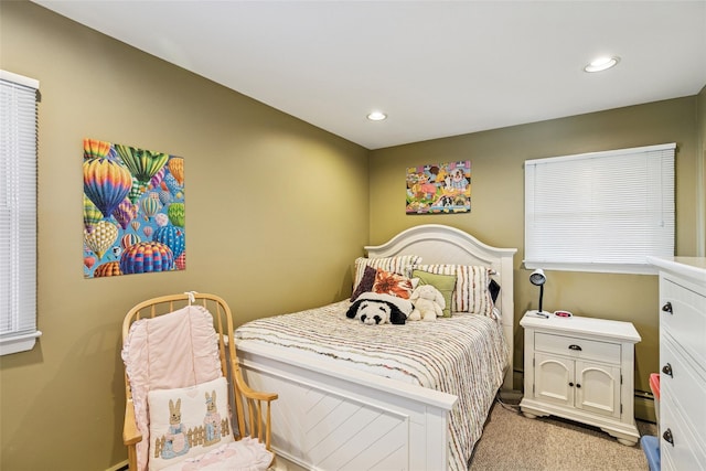 bedroom featuring baseboard heating, recessed lighting, and light colored carpet