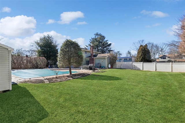 view of yard featuring a fenced backyard and a fenced in pool