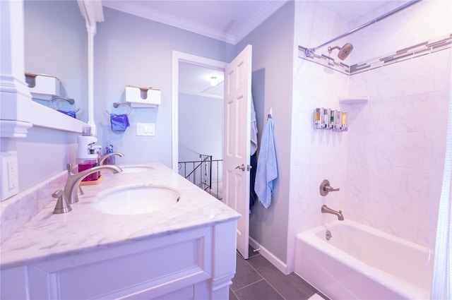 bathroom with ornamental molding, tile patterned flooring, shower / bath combination, and a sink