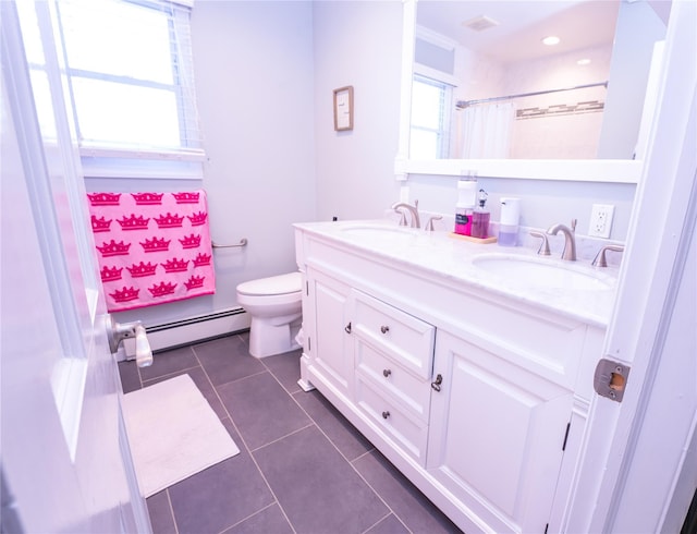 full bath featuring a baseboard radiator, a sink, toilet, and tile patterned floors