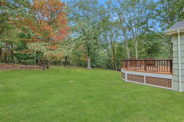 view of yard featuring a wooden deck