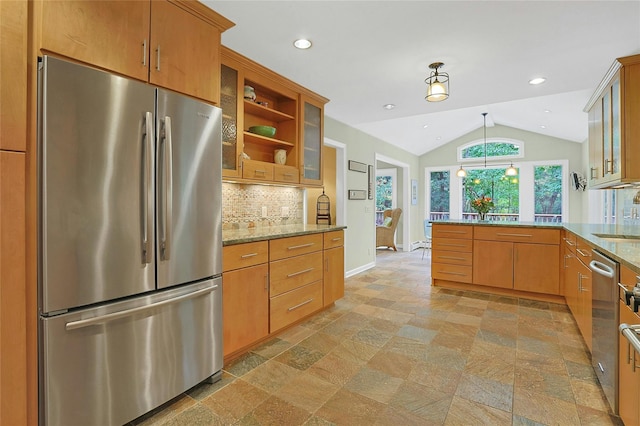 kitchen with lofted ceiling, glass insert cabinets, a peninsula, stainless steel appliances, and backsplash