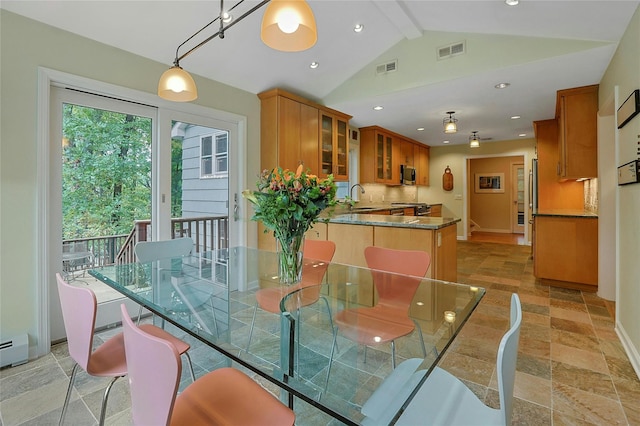 dining area with vaulted ceiling with beams, recessed lighting, visible vents, baseboards, and stone finish flooring