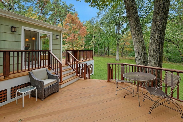 deck featuring a lawn