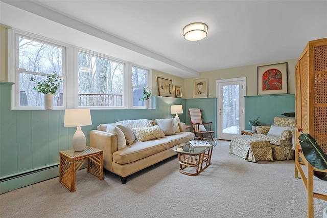 living area with carpet floors and baseboard heating