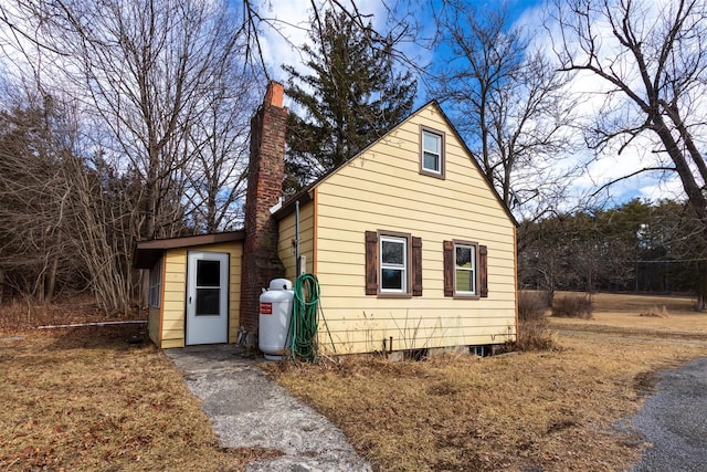 view of front of house with a chimney