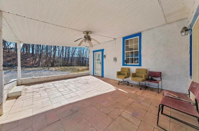 view of patio with ceiling fan