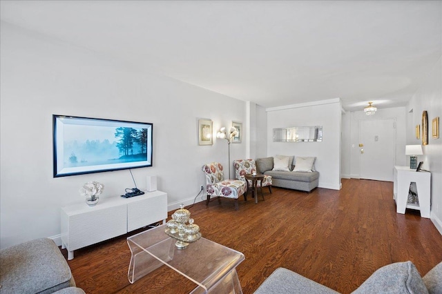 living room with baseboards and wood finished floors