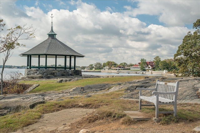 view of home's community featuring a water view and a gazebo