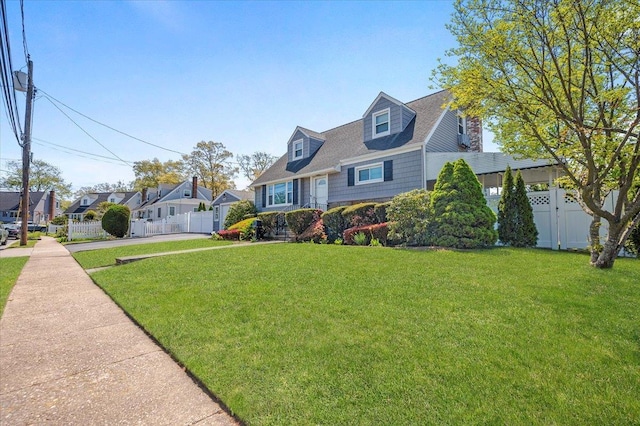 new england style home featuring a residential view