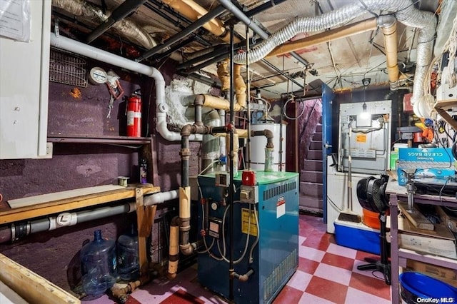 utilities featuring gas water heater and a heating unit