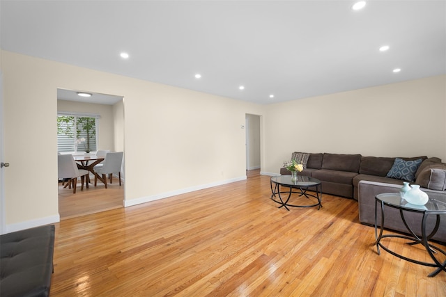 2057 Renfrew Ave, Elmont, NY 11003 - living area with light wood-style flooring, recessed lighting, and baseboards