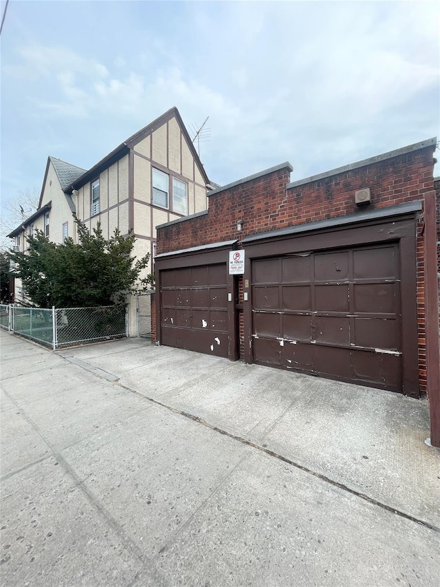 view of gate featuring fence