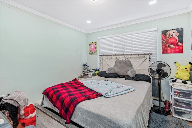 bedroom featuring recessed lighting, wood finished floors, and crown molding