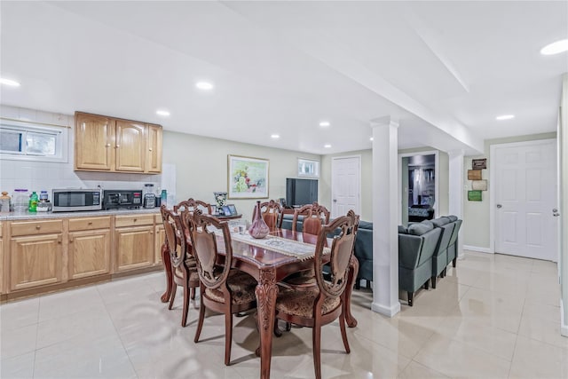 dining room featuring light tile patterned floors and recessed lighting