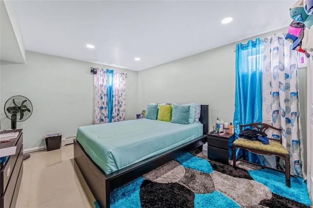 bedroom with recessed lighting, baseboards, and baseboard heating